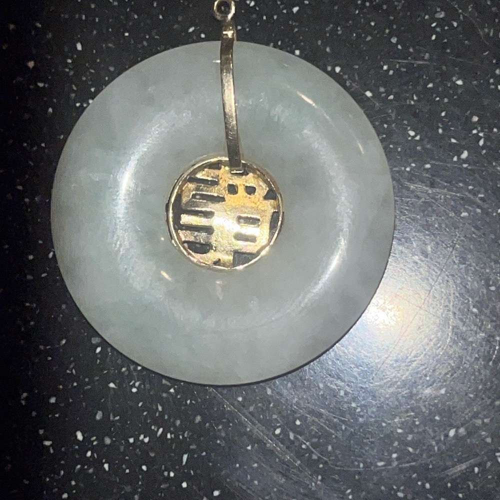 Elegant Jade Pendant with Gold Accent